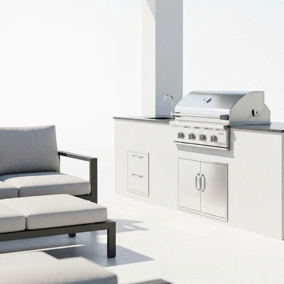 Outdoor kitchen setup with built-in grill and seating area