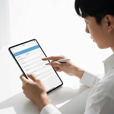 User submitting online form on tablet